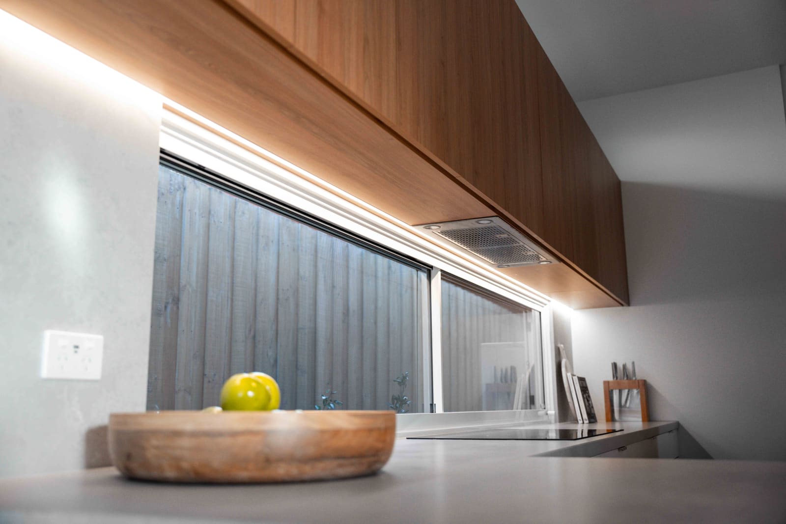 Finished kitchen fittings from the all-electric Northcote renovation by AIF Electrical
